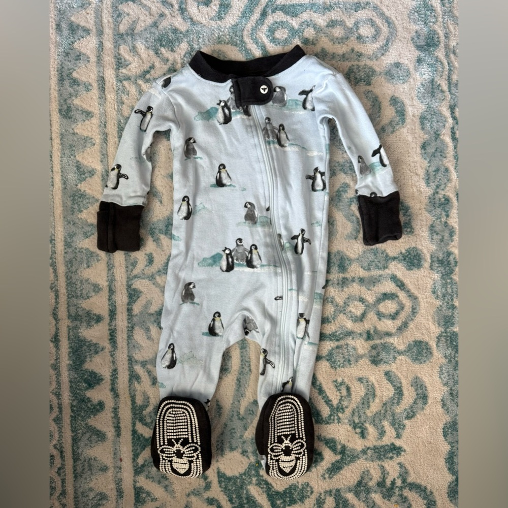 Burt’s Bees Baby boy footie. Size 0-3 month. Blue penguins pattern. Like new!